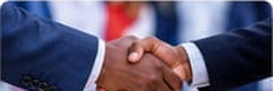 Business partners shaking hands